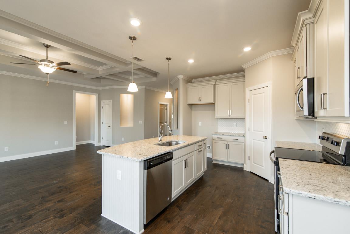 411 Butler Road Mount Juliet, TN 37122 - Photo 9 of 30 a large white kitchen with a stove a sink a refrigerator and a refrigerator