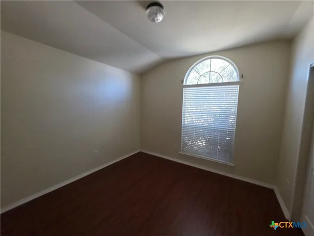a bathroom with a toilet and a bathtub