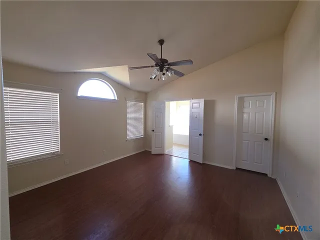 a bathroom with a sink a mirror and a bathtub