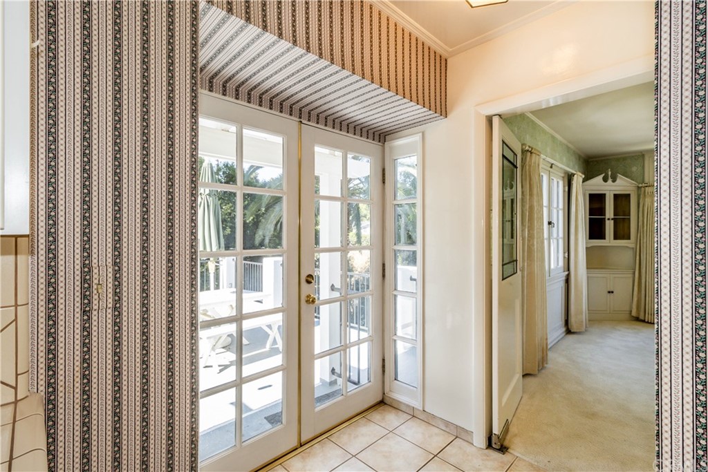 215 Grandview Drive Redlands, CA 92373 - Photo 30 of 69 French doors off kitchen leading to another upper level deck