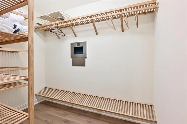 a view of a room with racks on the wall