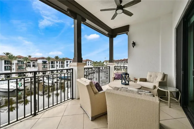 a view of balcony with furniture