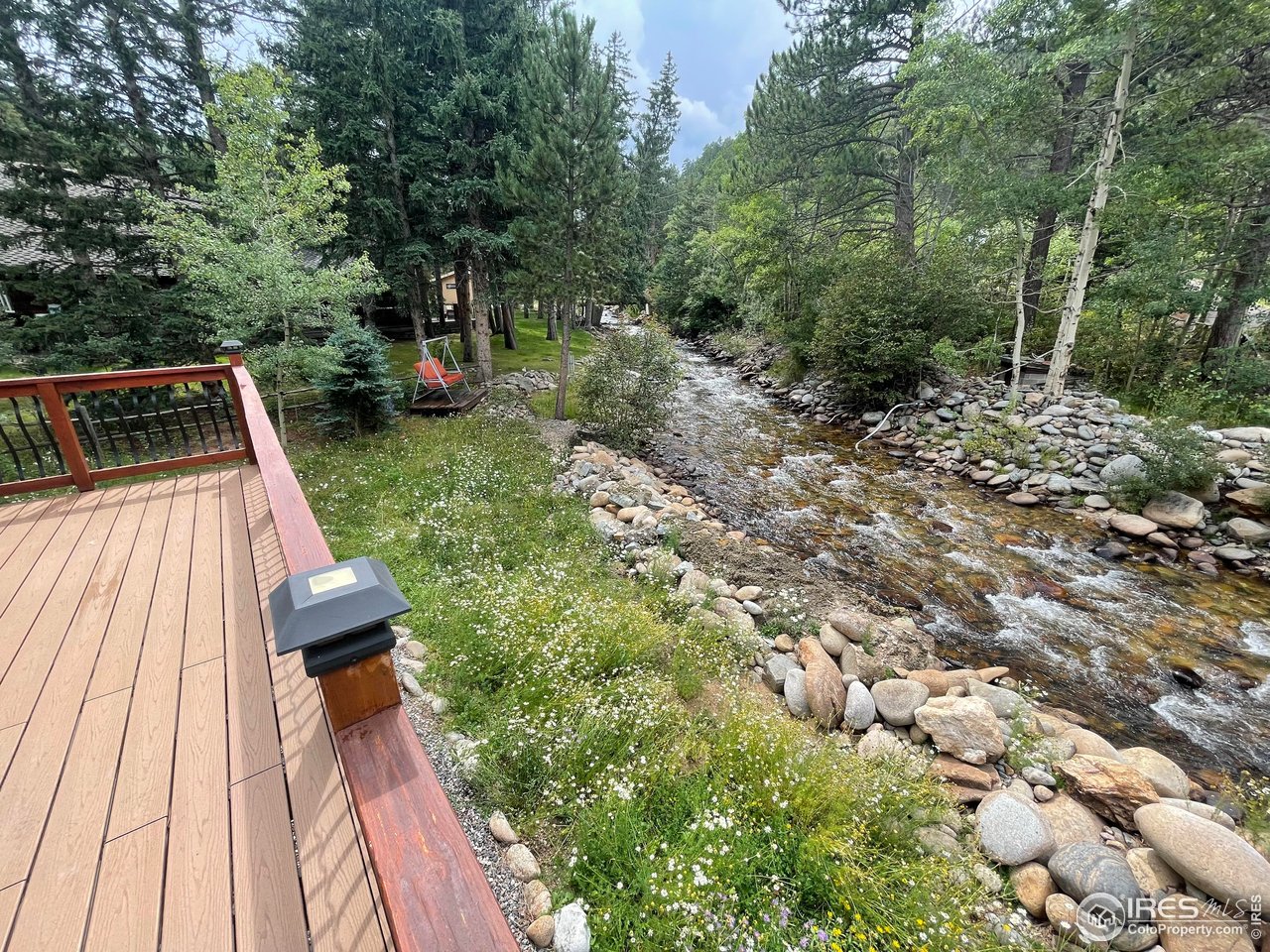 664 Riverside Drive Lyons, CO 80540 - Photo 14 of 16 a view of deck with patio