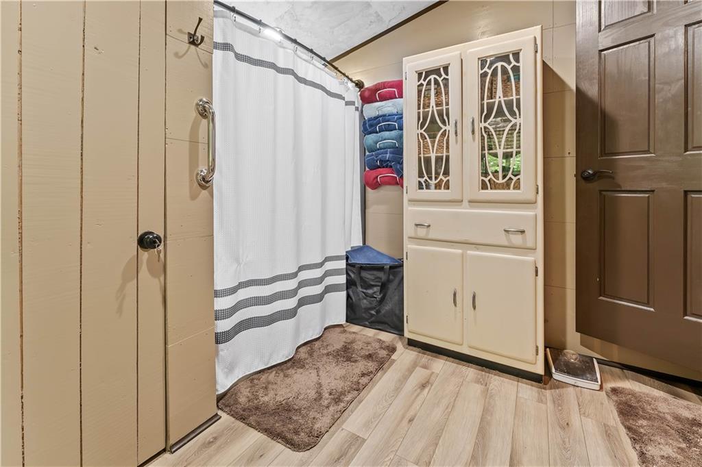 124 New Beaver Creek Road Markleysburg, PA 15459 - Photo 28 of 31 a bedroom with a bed and a window