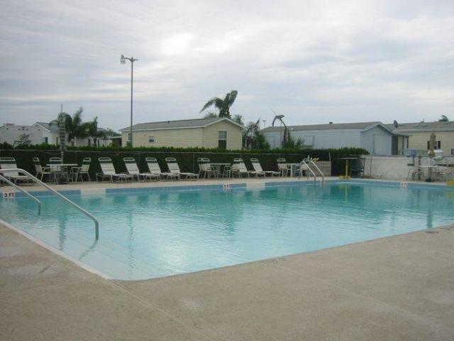 7950 Highway 78, Unit 7 Okeechobee, FL 34974 - Photo 5 of 10 a view of a lake with a nearby beach