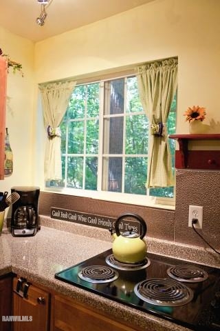 33 Galena Ridge Drive Stockton, IL 61085 - Photo 3 of 23 a kitchen with a stove and a sink