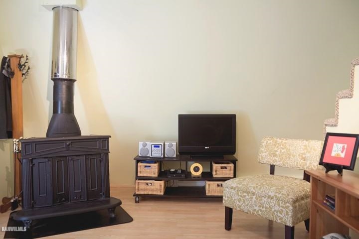 33 Galena Ridge Drive Stockton, IL 61085 - Photo 7 of 23 a living room with furniture and a flat screen tv