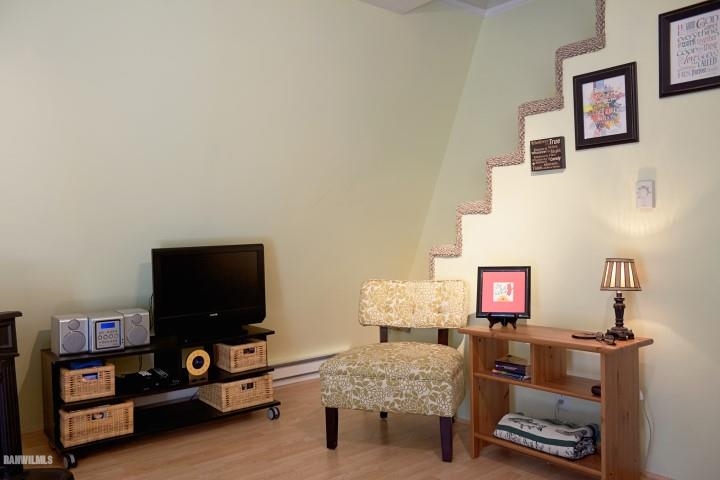 33 Galena Ridge Drive Stockton, IL 61085 - Photo 8 of 23 a bedroom with furniture and a flat screen tv