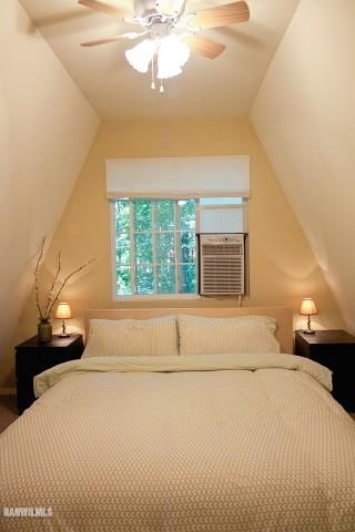 33 Galena Ridge Drive Stockton, IL 61085 - Photo 9 of 23 a bedroom with a large bed and a chandelier