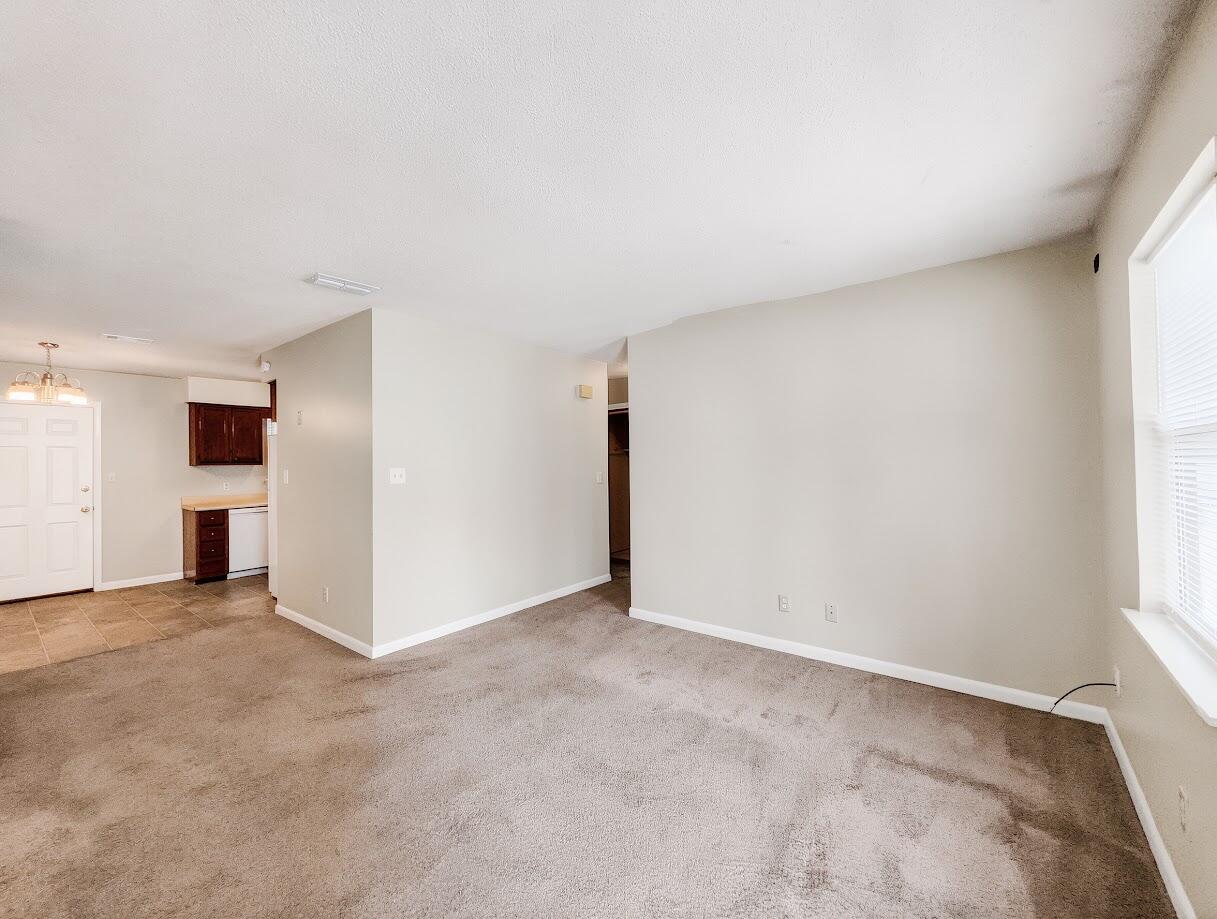 208 Squirrel Haven Road, Unit A Mary Esther, FL 32569 - Photo 3 of 16 an empty room with window