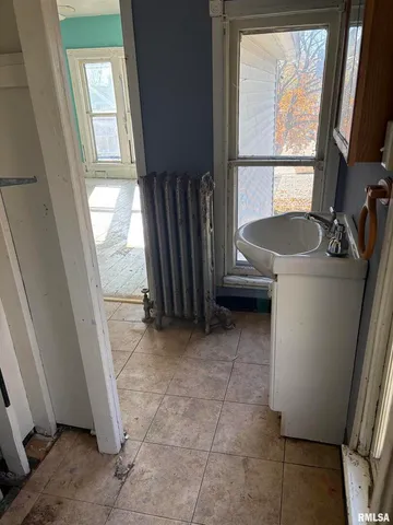 a view of an entryway with a door