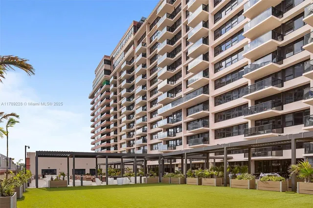 a view of a building with yard