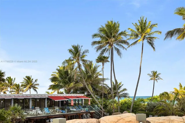 an aerial view of a building with outdoor space