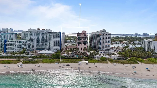 a view of a patio with couches and potted plants