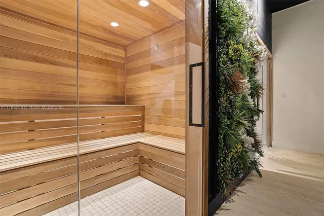 a bathroom with a shower and toilet