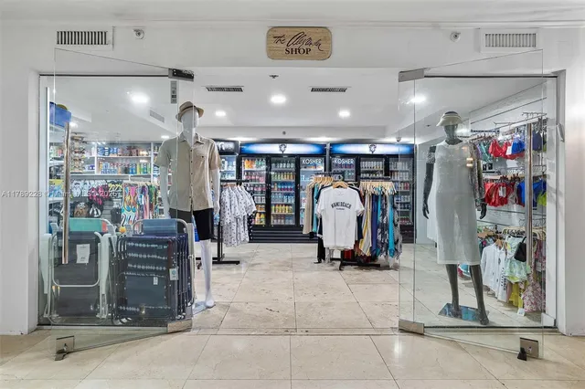 a picture of a bathroom with a shower