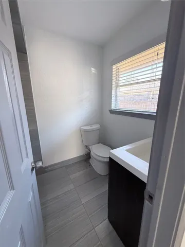 a bathroom with a toilet