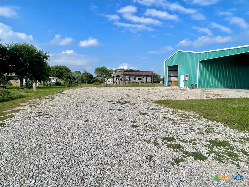 211 5th Street Port O'Connor, TX 77982 - Photo 16 of 22 a view of a house with a yard