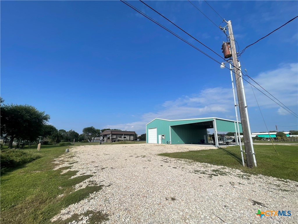 211 5th Street Port O'Connor, TX 77982 - Photo 21 of 22 a view of a house with a yard