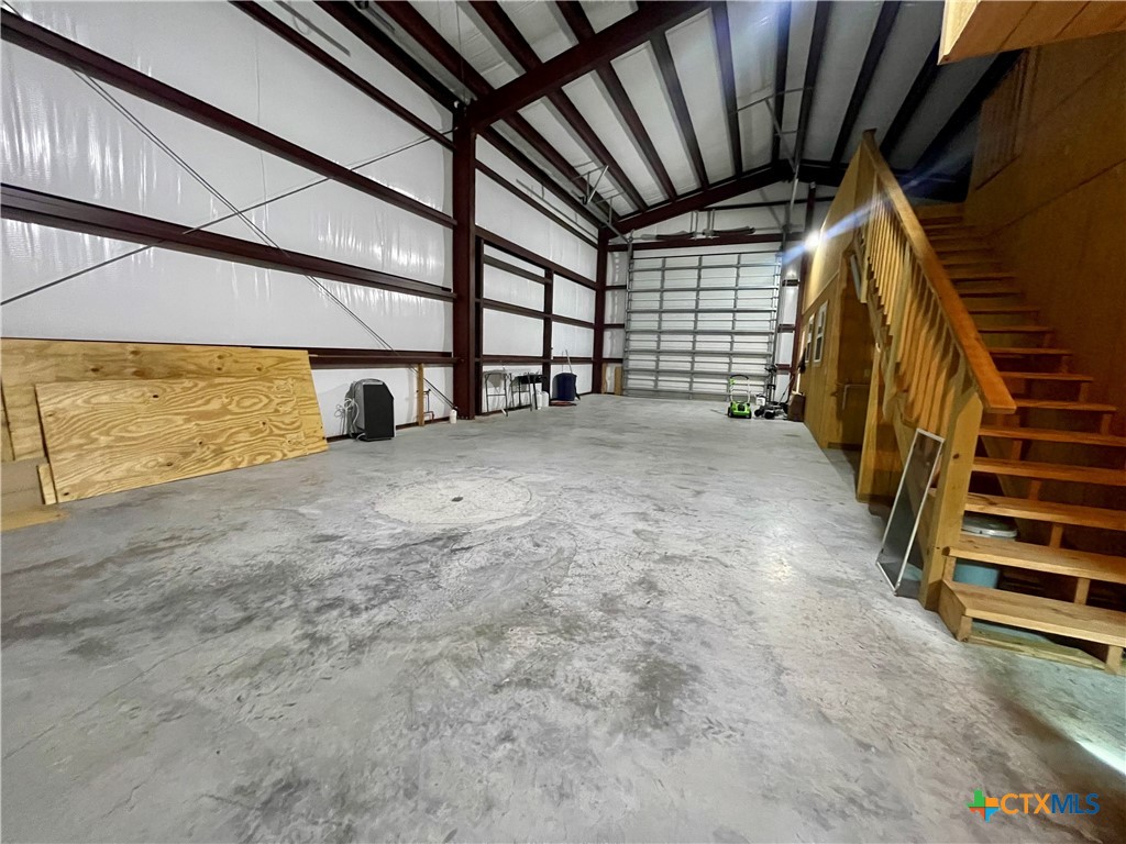 211 5th Street Port O'Connor, TX 77982 - Photo 10 of 22 a view of an empty room with stairs