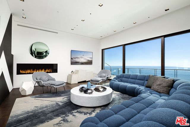 a view of a balcony with lake view and mountain view