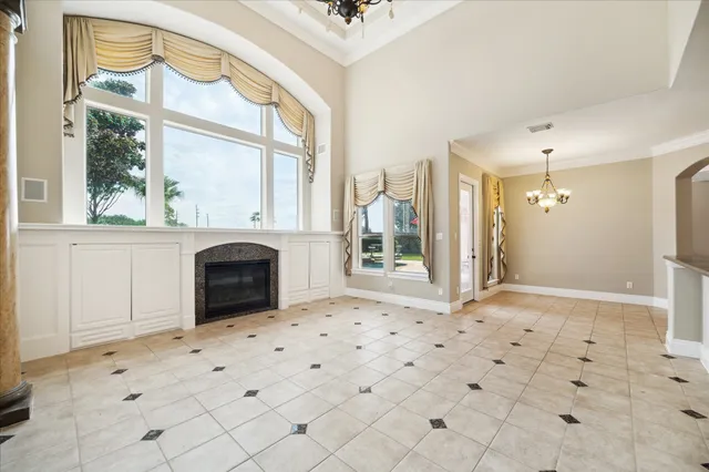 a spacious bathroom with a sink mirror and a shower
