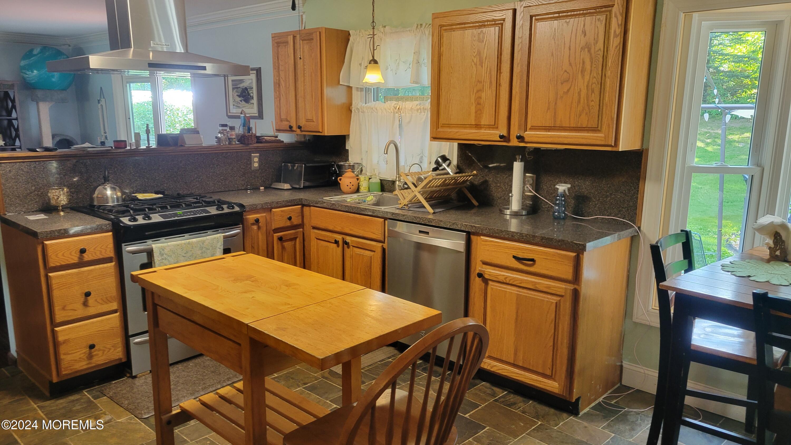 15 Bock Boulevard Howell, NJ 07731 - Photo 11 of 21 a kitchen with stainless steel appliances granite countertop a stove a sink dishwasher and cabinets with wooden floor