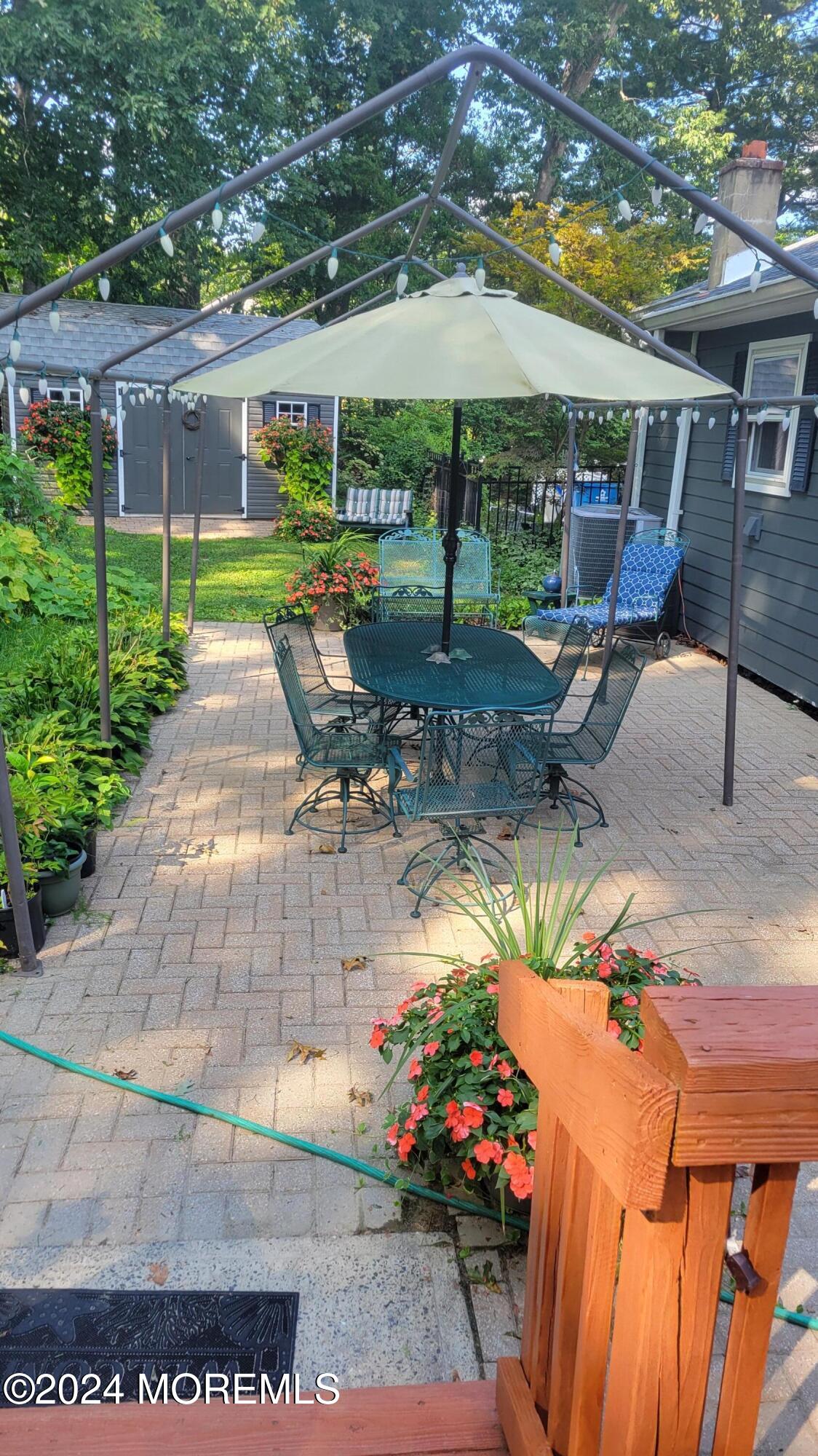 15 Bock Boulevard Howell, NJ 07731 - Photo 19 of 21 a view of a backyard with sitting area