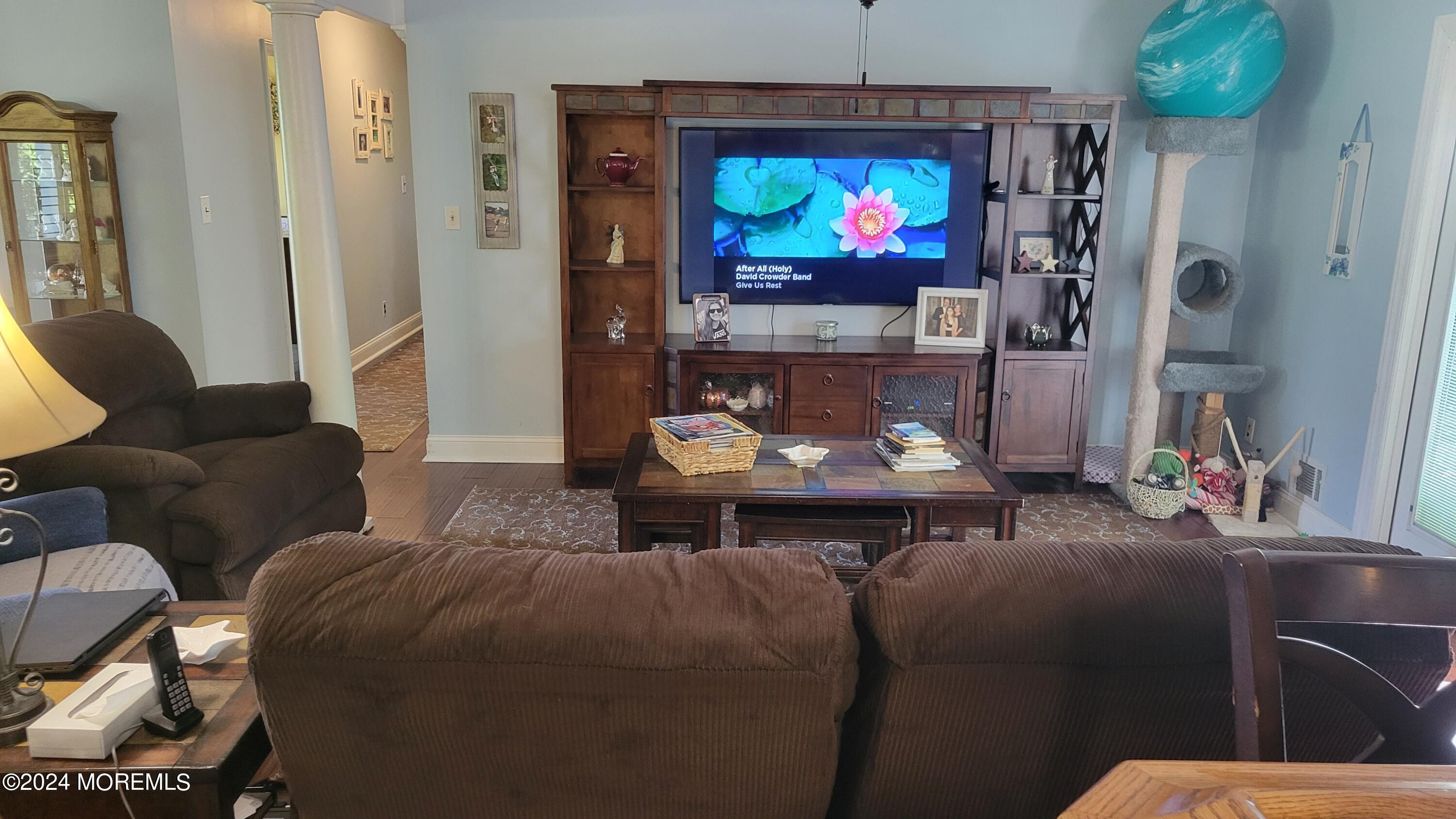 15 Bock Boulevard Howell, NJ 07731 - Photo 7 of 21 a living room with furniture and a flat screen tv