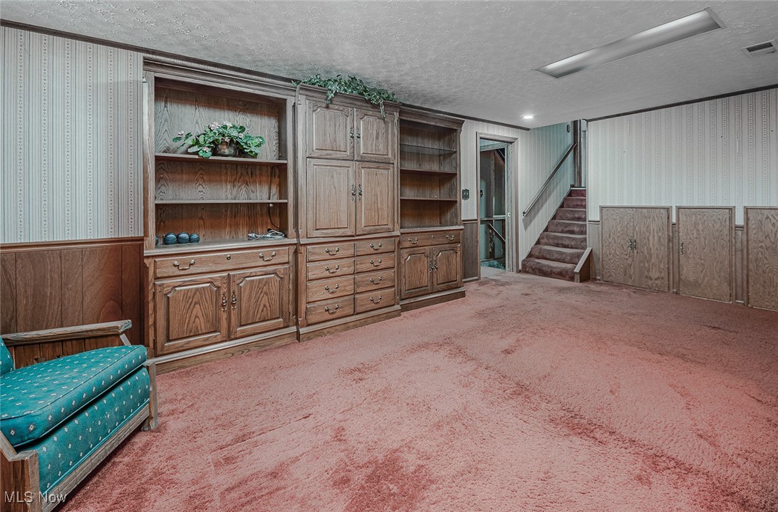 3375 Bancroft Road Akron, OH 44333 - Photo 19 of 45 The recreation room is a few steps down from the family room