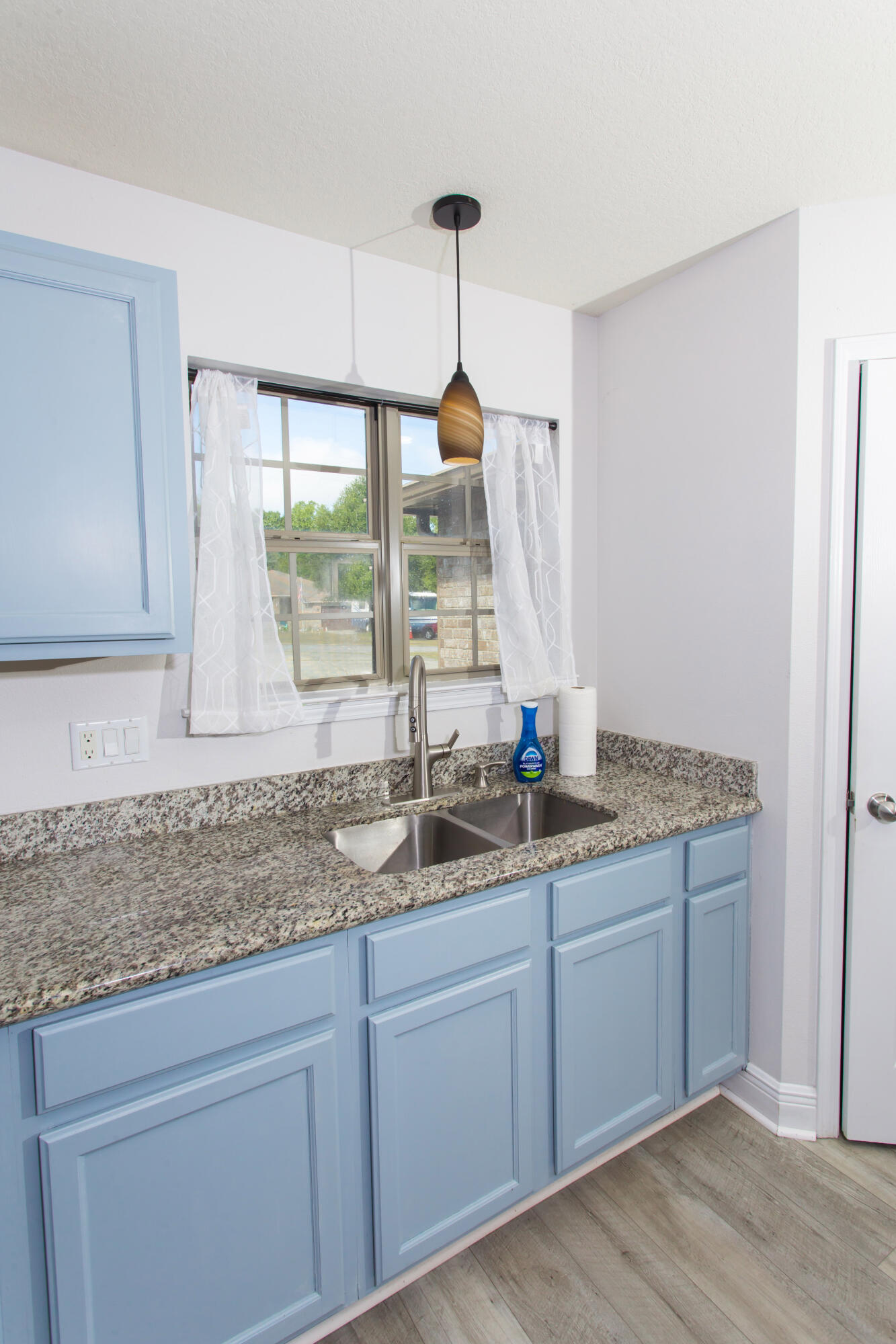 6229 Flash Lane Crestview, FL 32536 - Photo 14 of 51 a kitchen with granite countertop a sink and cabinets