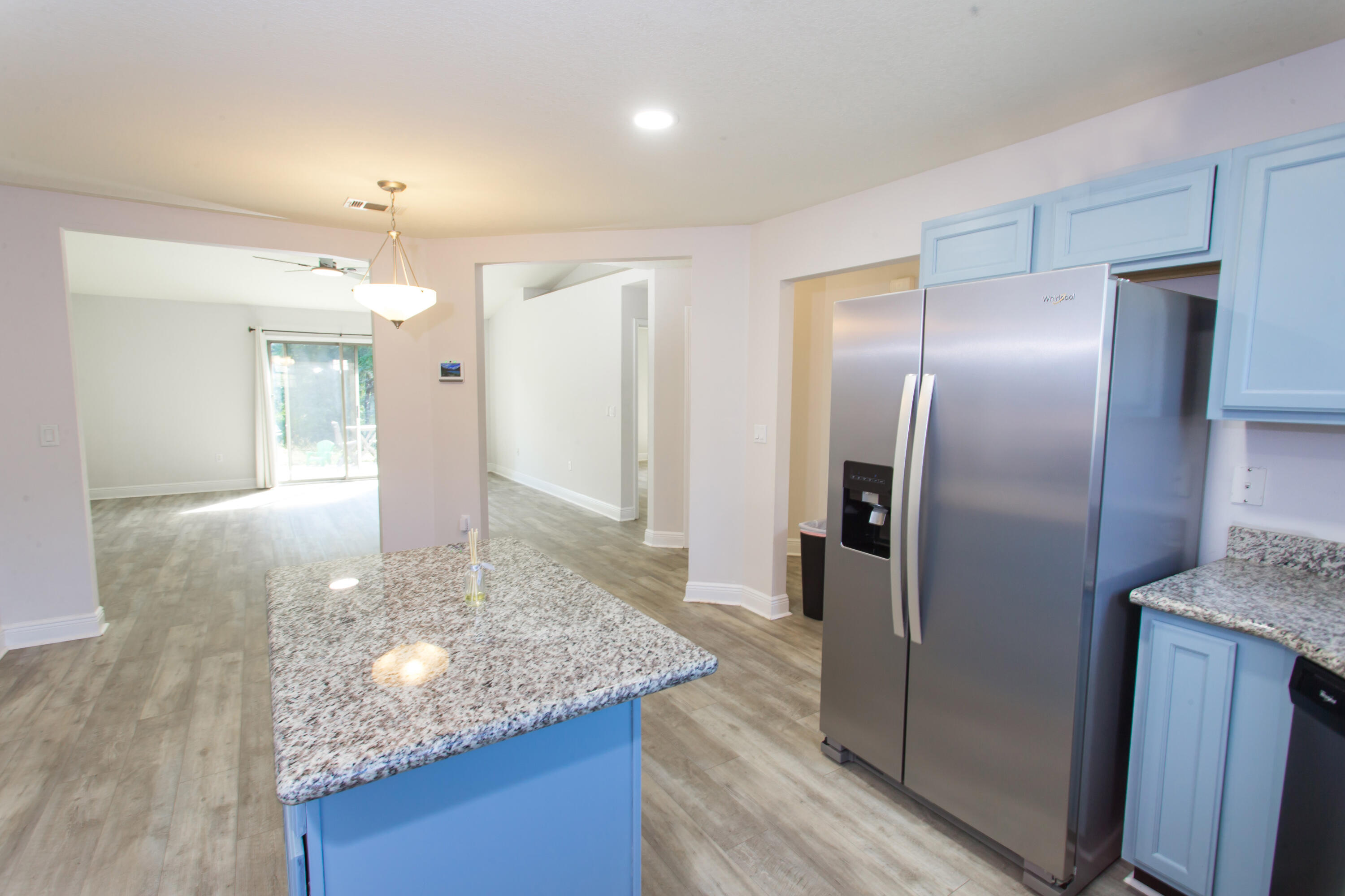 6229 Flash Lane Crestview, FL 32536 - Photo 16 of 51 a kitchen with kitchen island a counter top space cabinets and stainless steel appliances