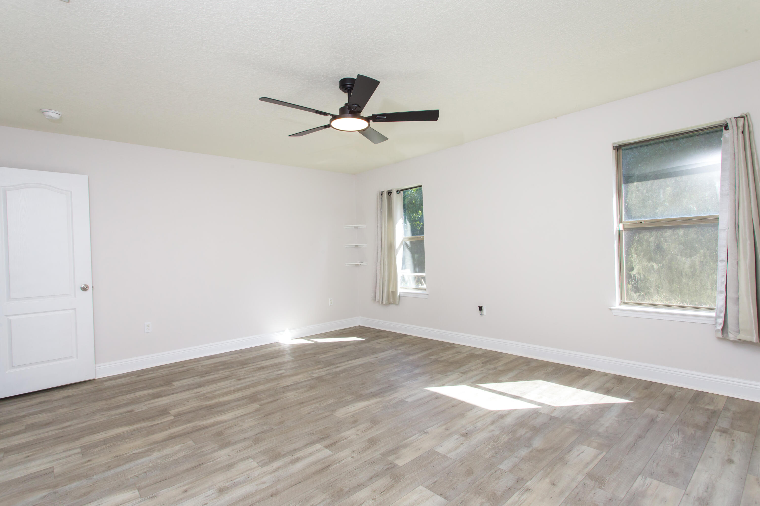 6229 Flash Lane Crestview, FL 32536 - Photo 23 of 51 a view of an empty room with a window