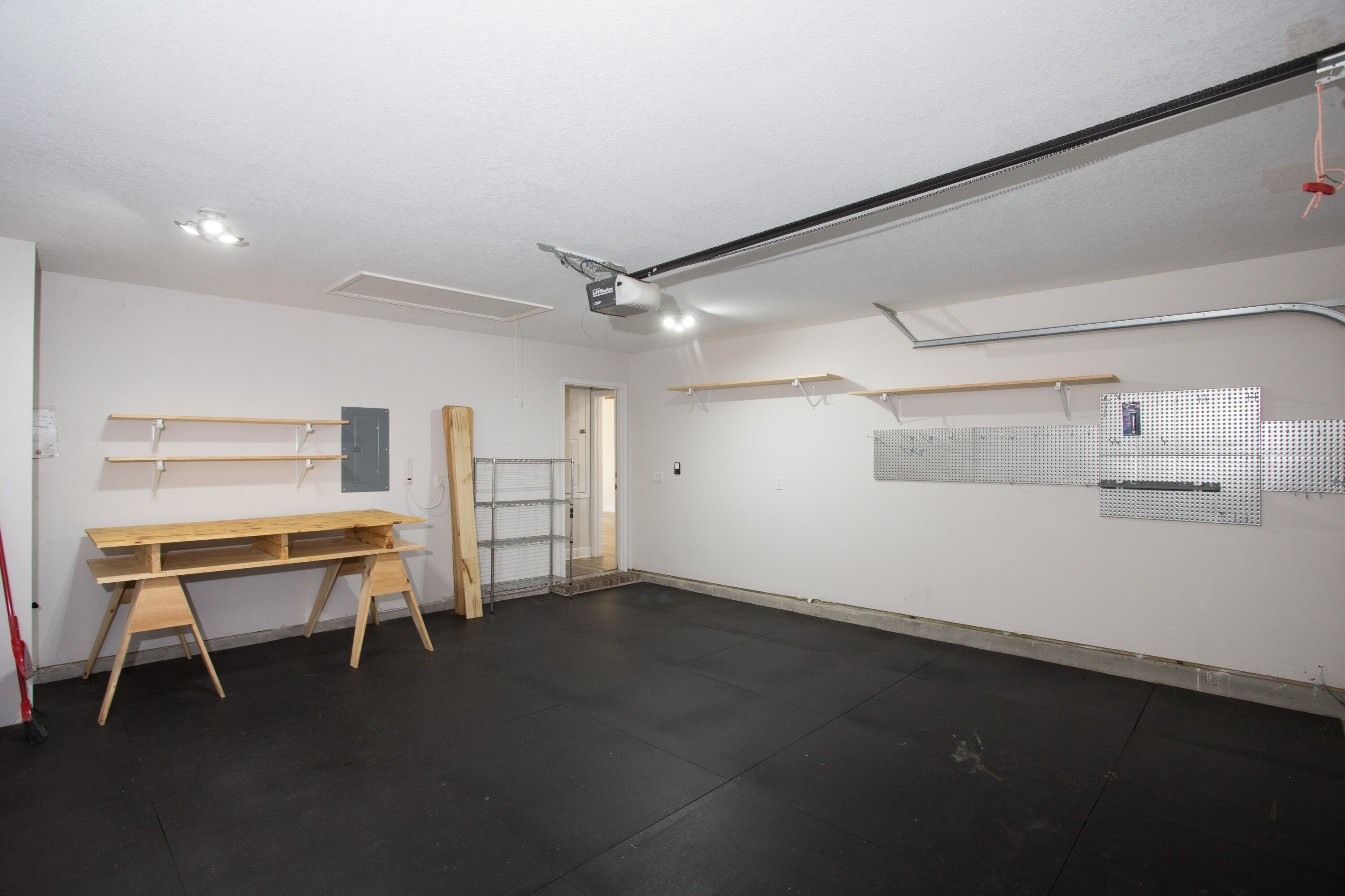 6229 Flash Lane Crestview, FL 32536 - Photo 36 of 51 an empty room with windows and wooden walls