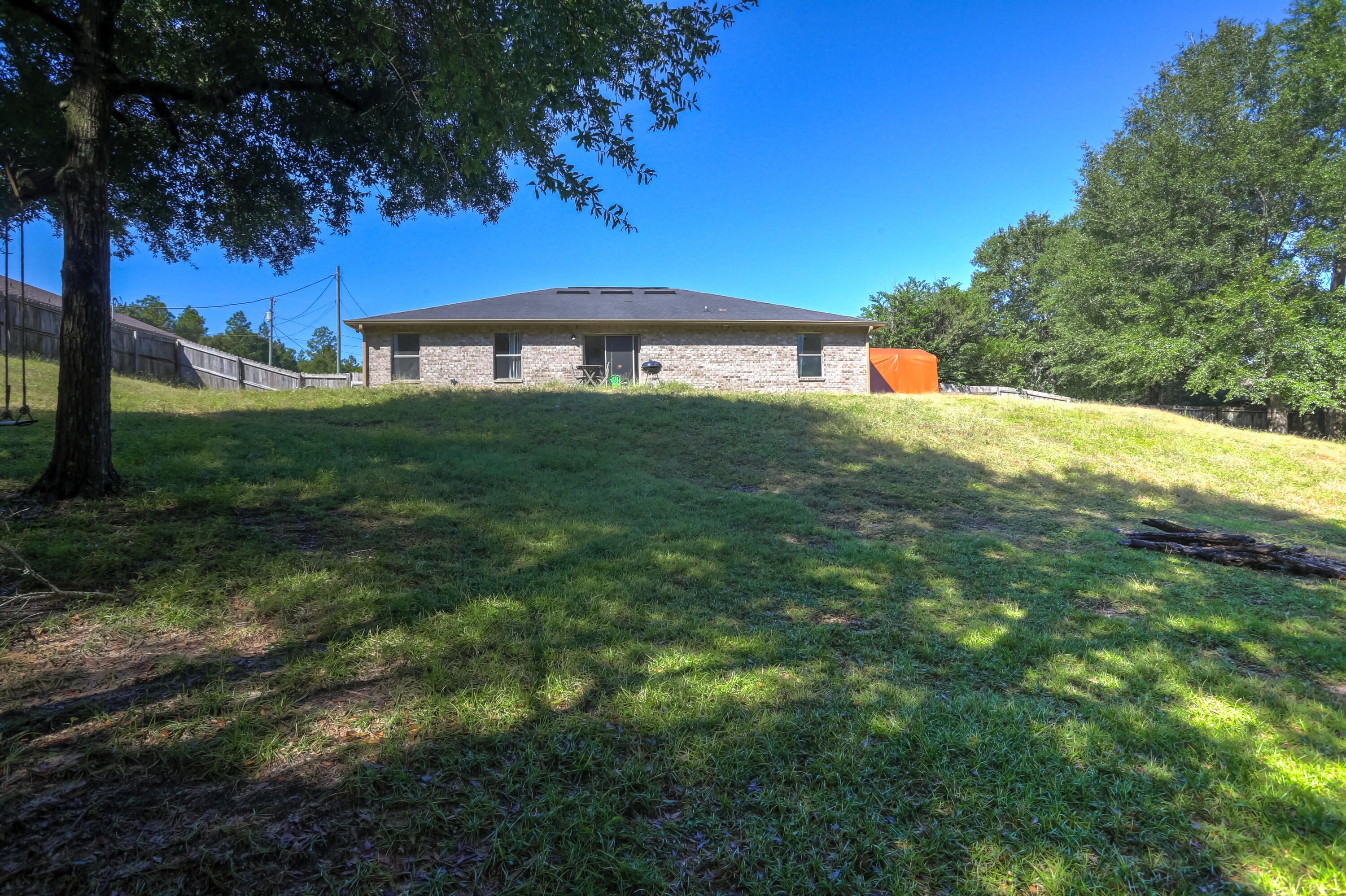 6229 Flash Lane Crestview, FL 32536 - Photo 39 of 51 a view of a house with a yard