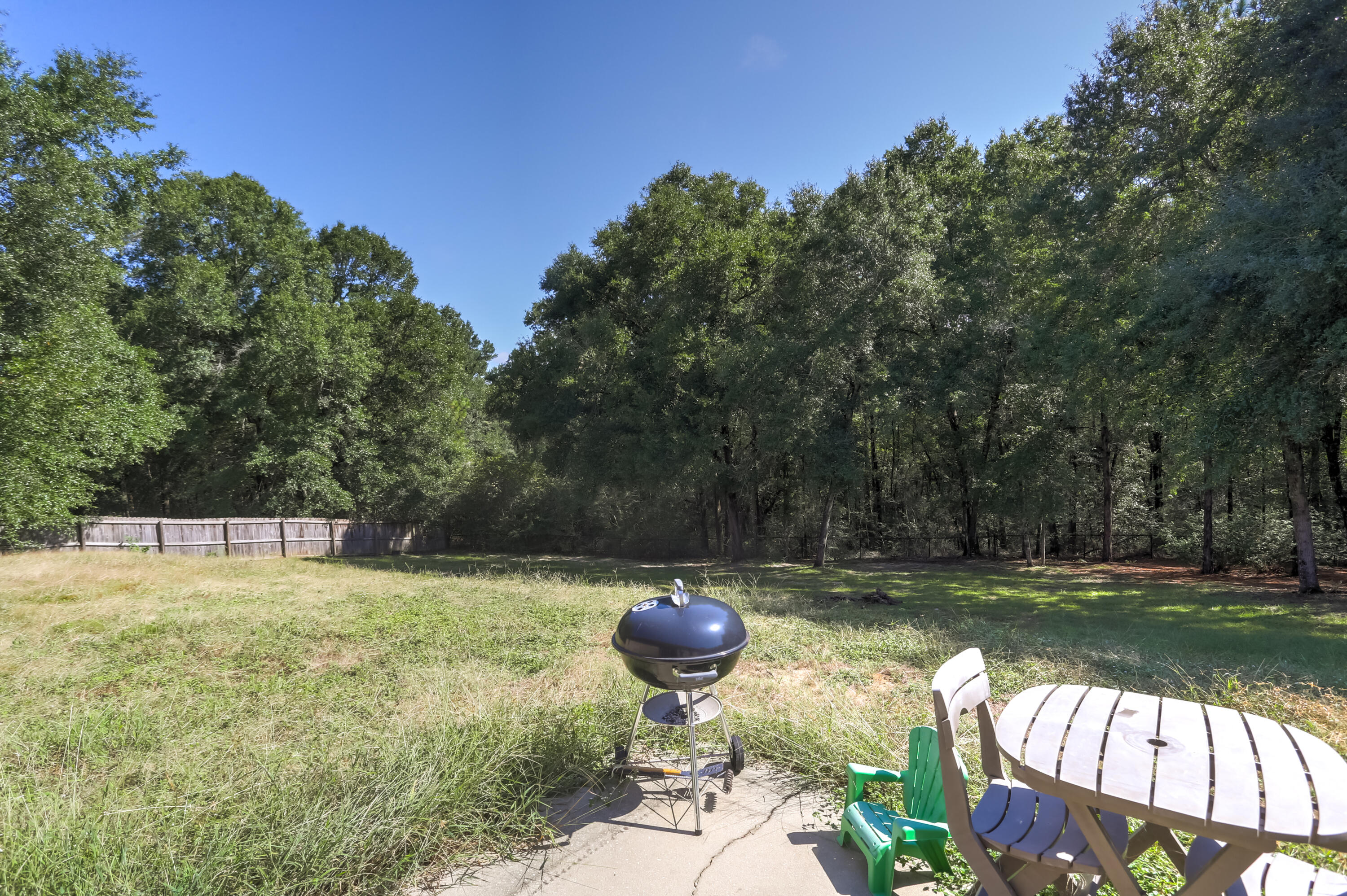 6229 Flash Lane Crestview, FL 32536 - Photo 43 of 51 a view of a swimming pool with a patio and a yard