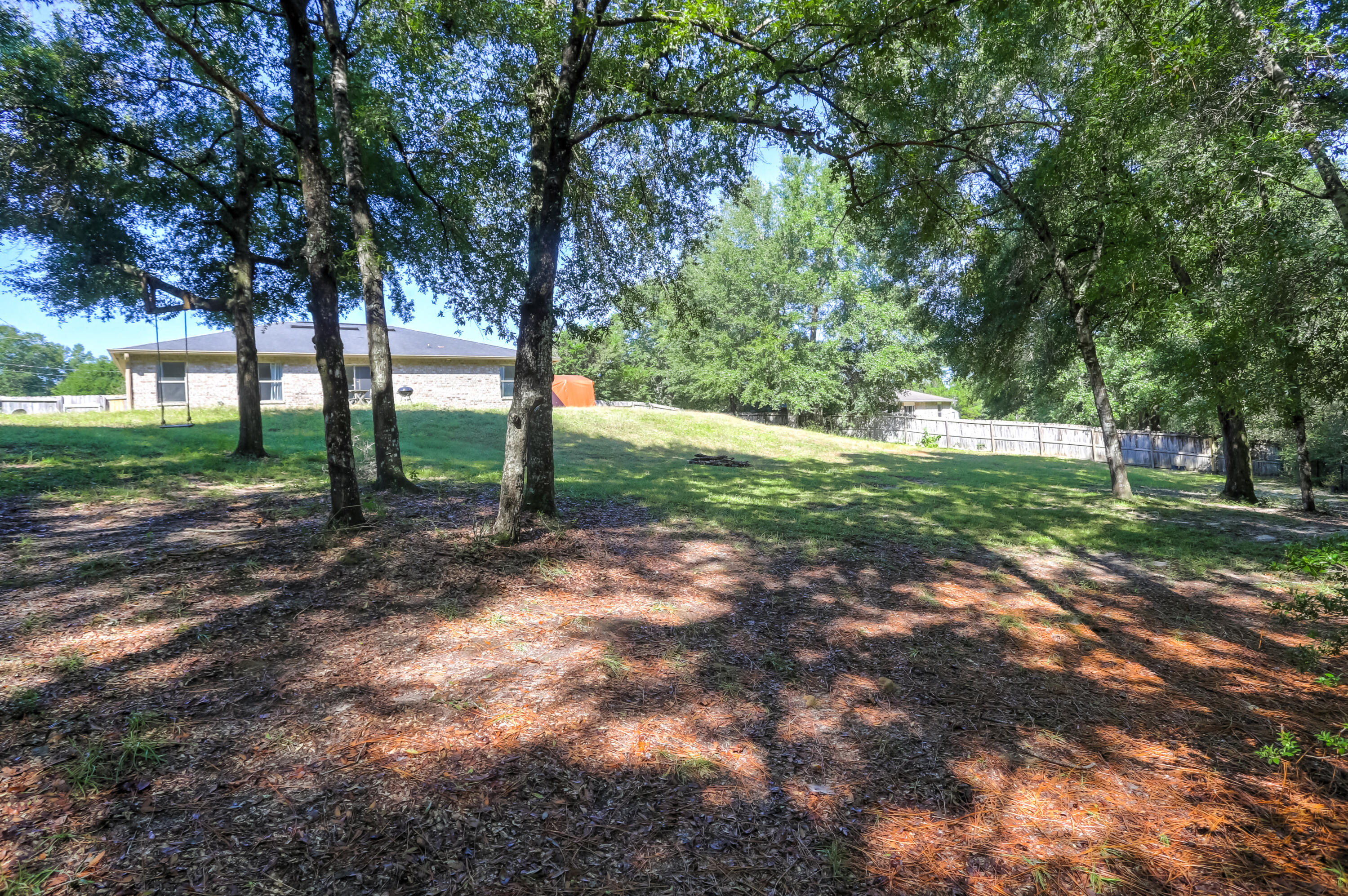 6229 Flash Lane Crestview, FL 32536 - Photo 47 of 51 a view of a yard with tree s