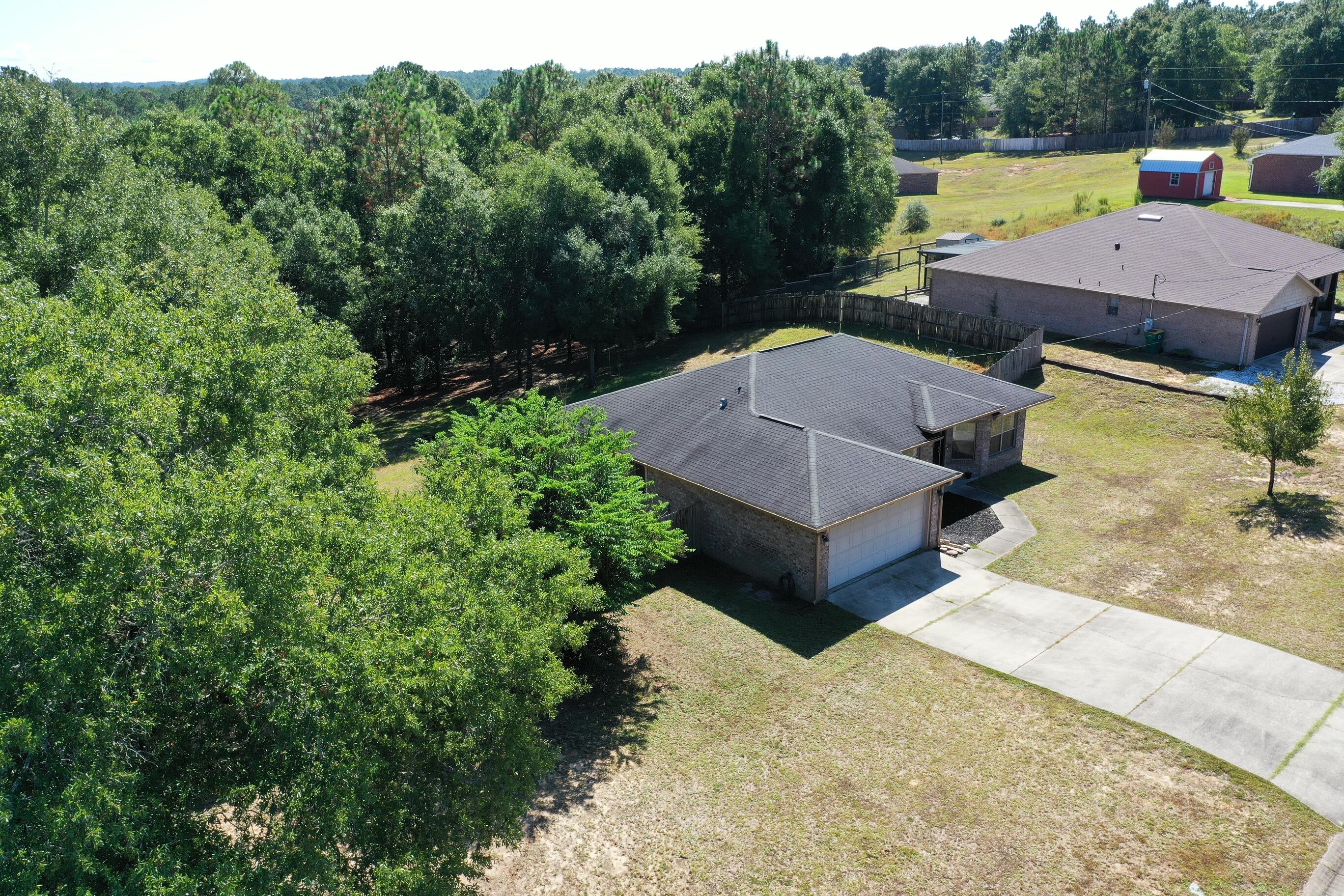 6229 Flash Lane Crestview, FL 32536 - Photo 49 of 51 an aerial view of a house with a yard