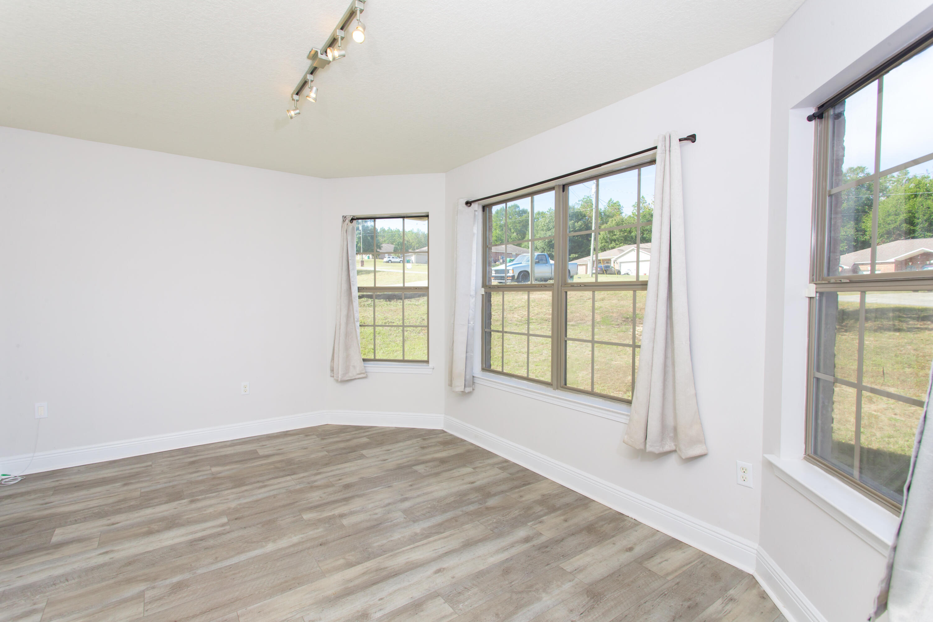 6229 Flash Lane Crestview, FL 32536 - Photo 6 of 51 a view of an empty room with a window