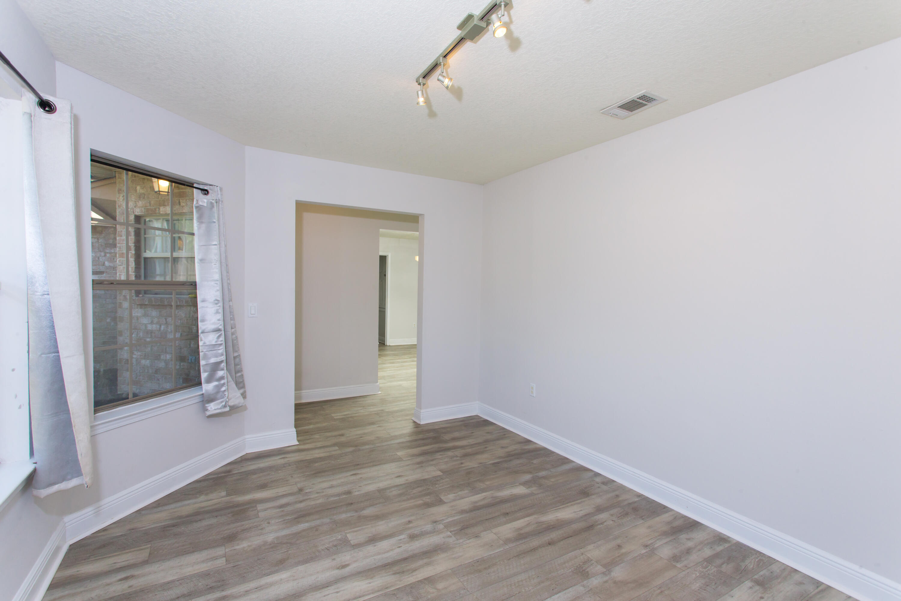 6229 Flash Lane Crestview, FL 32536 - Photo 8 of 51 wooden floor in an empty room