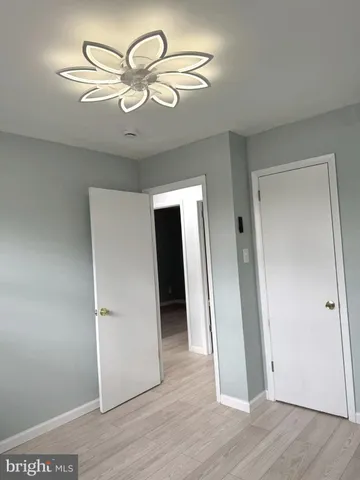 a view of a livingroom with wooden floor