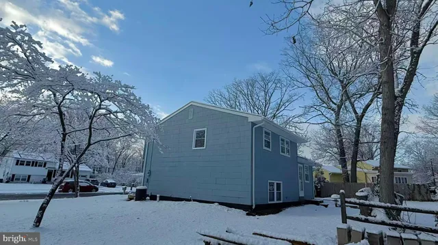 a view of a car park in front of house