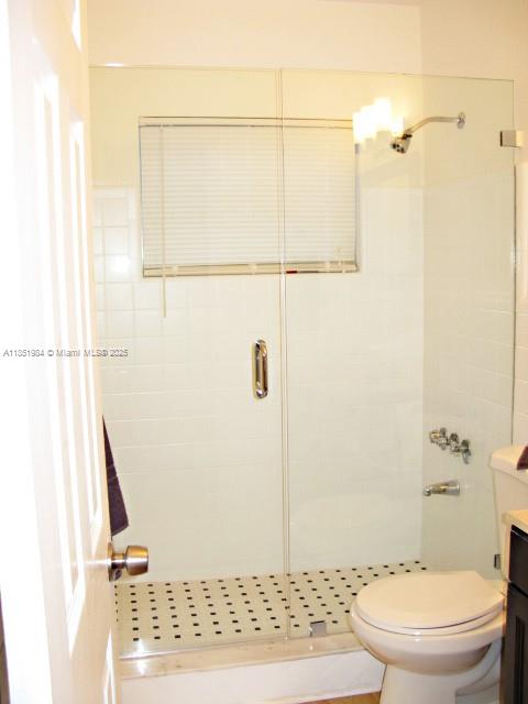 921 Meridian Avenue, Unit 9 Miami Beach, FL 33139 - Photo 9 of 17 a bathroom with a toilet and a shower