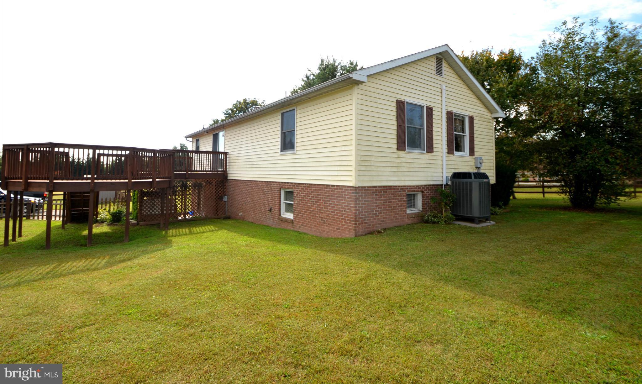 1403 Pleasant View Road Tuscarora, MD 21790 - Photo 13 of 13 a view of a house with backyard porch and sitting area