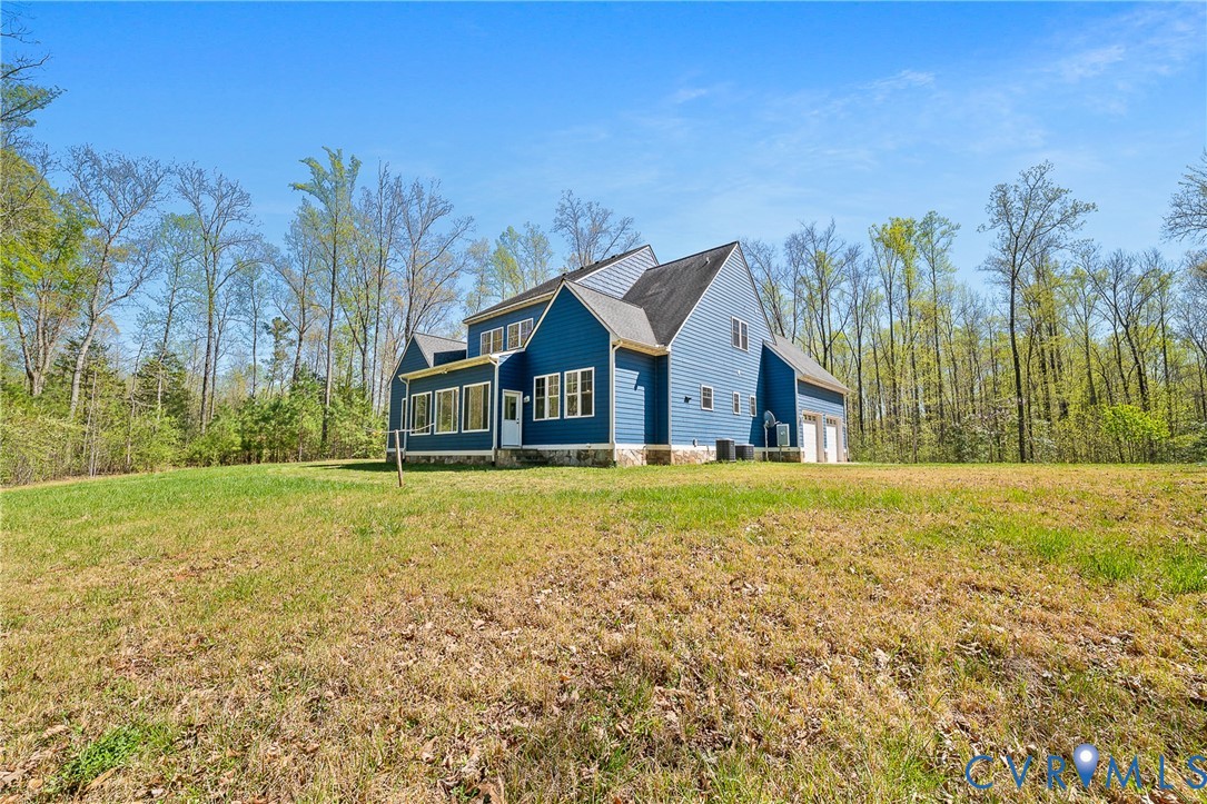 15430 River Road Chesterfield, VA 23838 - Photo 38 of 46 a house with trees in front of it