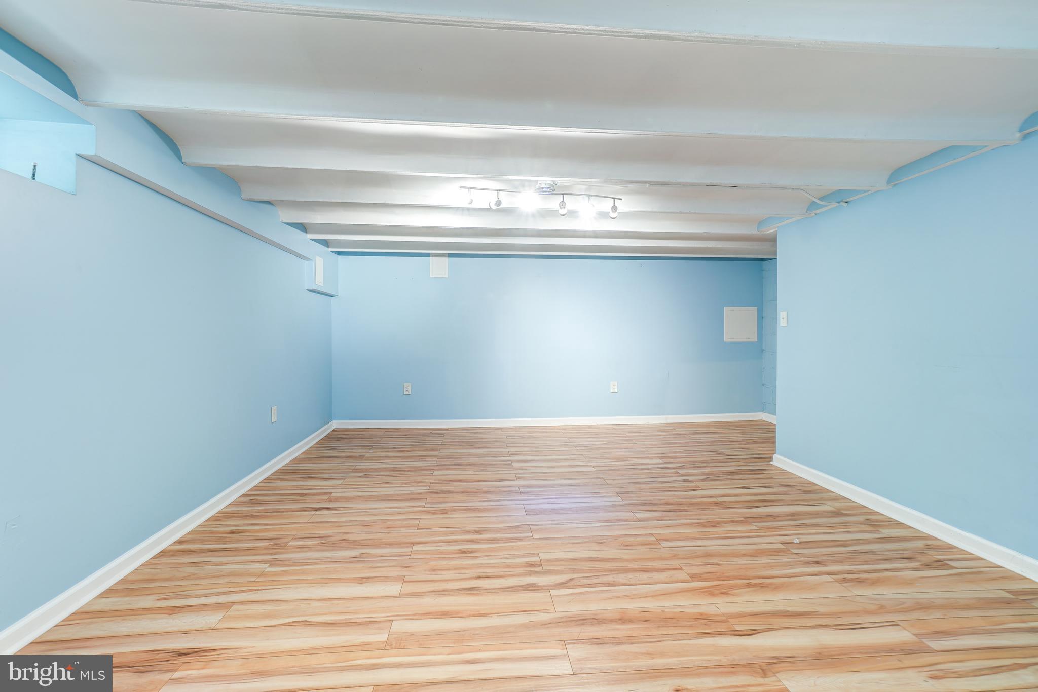 849 South Glebe Road Arlington, VA 22204 - Photo 25 of 38 Basement with vinyl flooring