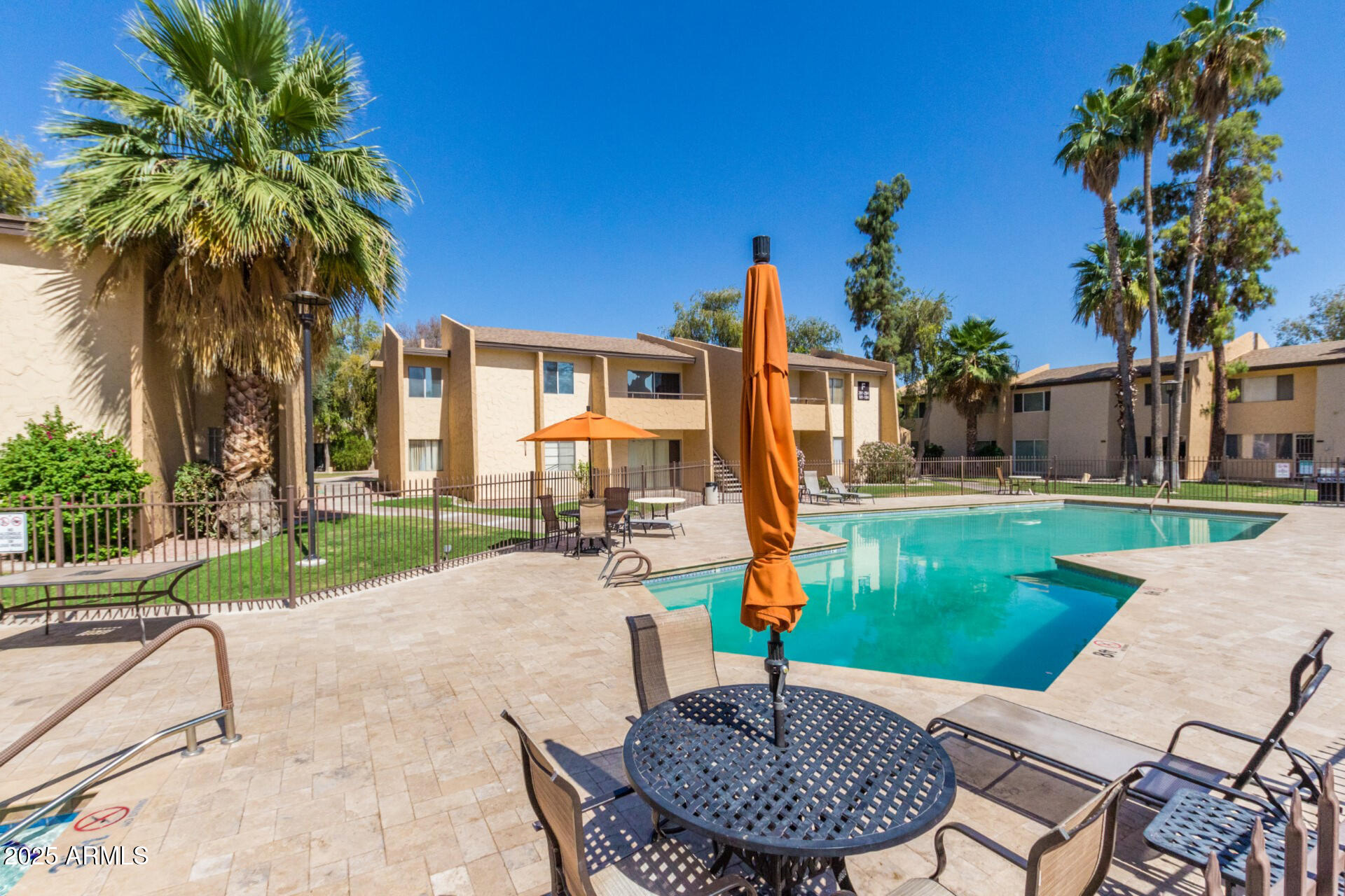 8055 East Thomas Road, Unit C104 Scottsdale, AZ 85251 - Photo 16 of 24 a view of a backyard with a patio