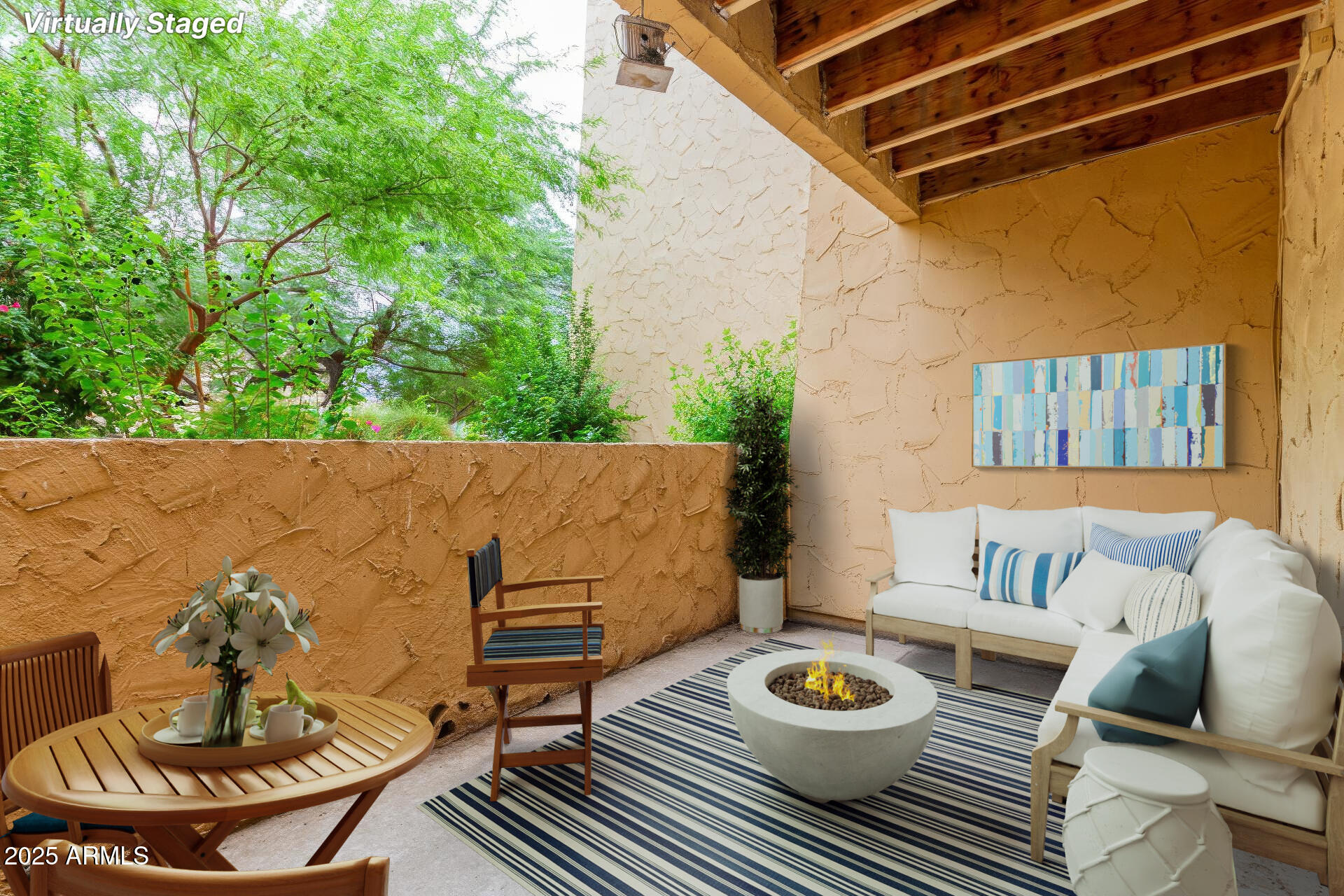 8055 East Thomas Road, Unit C104 Scottsdale, AZ 85251 - Photo 10 of 24 a balcony with table and chairs
