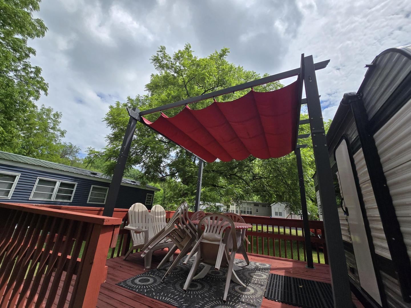 17-249 Woodhaven Sublette, IL 61367 - Photo 5 of 14 a view of a patio with table and chairs potted plants with wooden floor