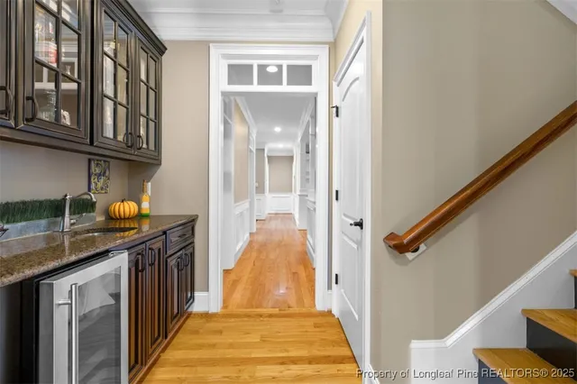 a view of a kitchen from the hallway